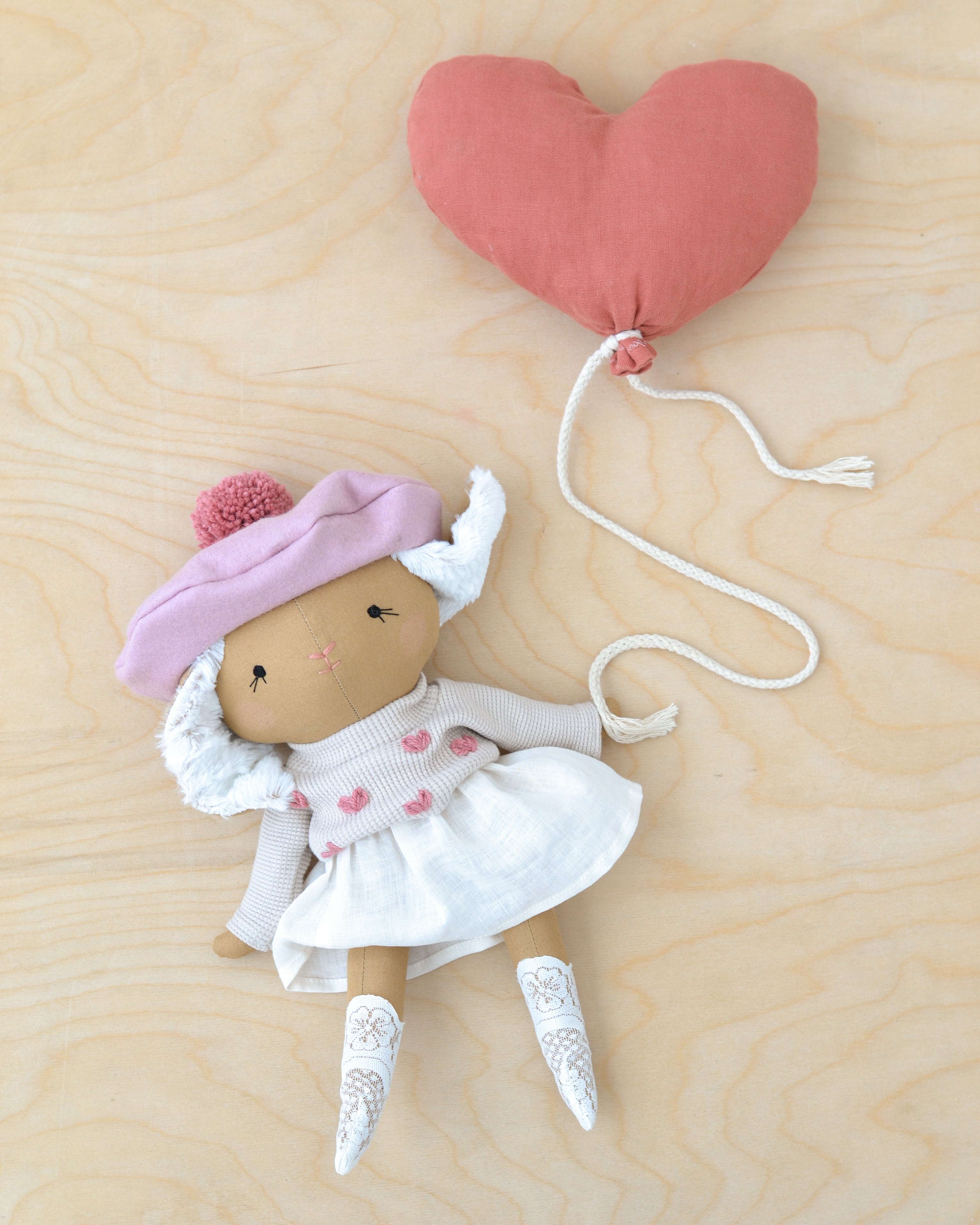 Bunny Doll in a Pink Skirt and Heart Sweater and a cute beret